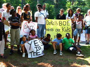 DeKalb County residents protest a proposed U.S Marine Corps academy during a school board meeting at Lakeside High School in Atlanta on June 1. The U.S. Marine Corps is wooing public school districts across the country, expanding a network of military academies that has grown steadily despite criticism that it's a recruiting ploy. AP Wide World Photo/Dorie Turner