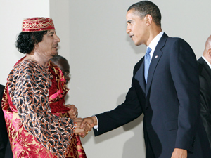 Obama shaking hands Qadaffi Muder photo Obama shaking hands Qadaffi Muder photo