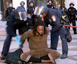 protester_cuffed11-29-2011.jpg