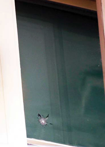 whitehouse_bullet_hole_10-14-2014.jpg