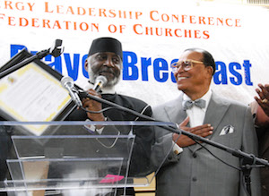 Rev._T.L._Barrett_and_Minister_Louis_Farrakhan.jpg