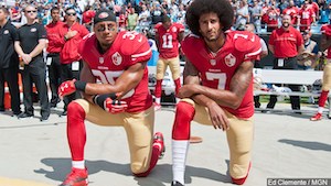 San_Francisco_49ers_Eric_Reid_and_Colin_Kaepernick_take_a_knee_during_the_National_Anthem_prior_to_their_game_against_the_Carolina_Panthers_in_Charlotte_North_Carolina__91816.jpg